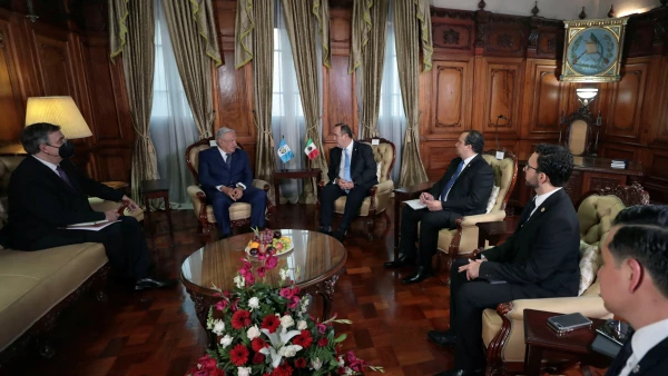 Guatemala’s President Alejandro Giammattei meets with Mexico's President Andres Manuel Lopez Obrador at the National Palace of Culture during Obrador's visit to Guatemala