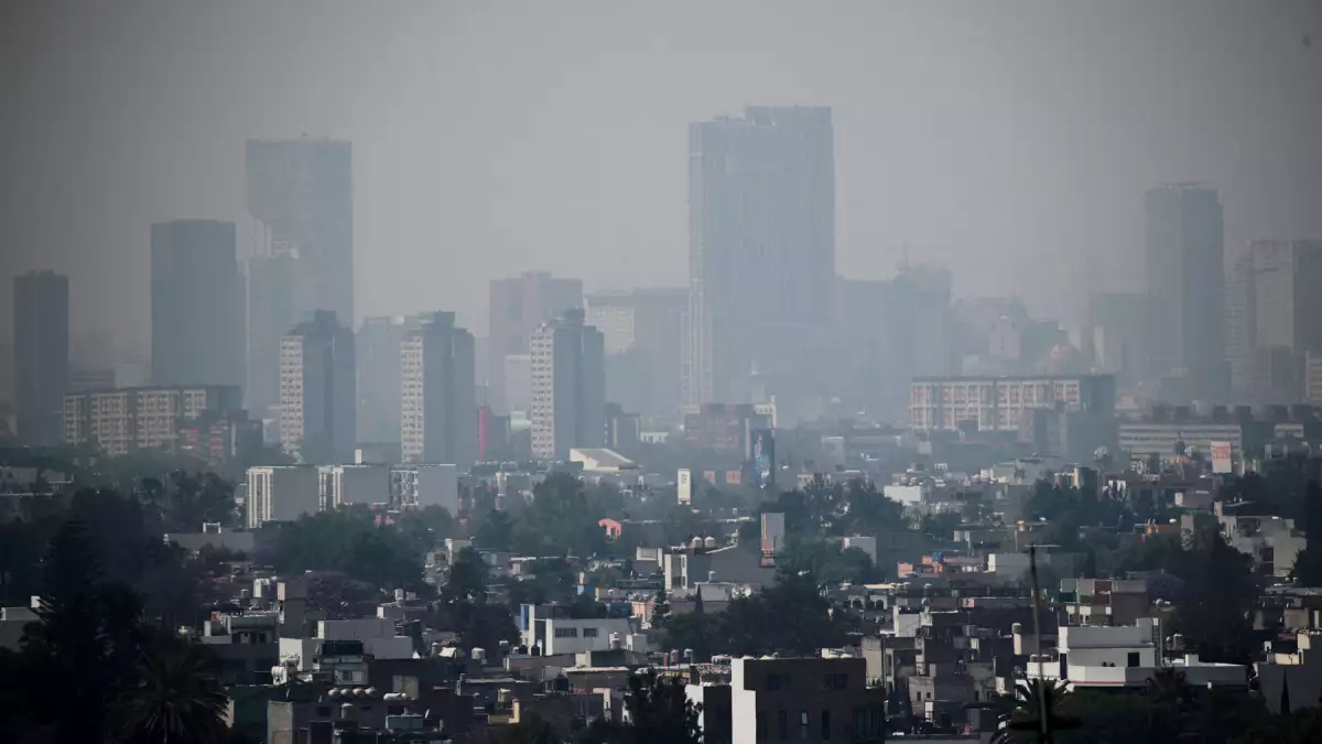 A general view of buildings and houses covered by pollution in Mexico City