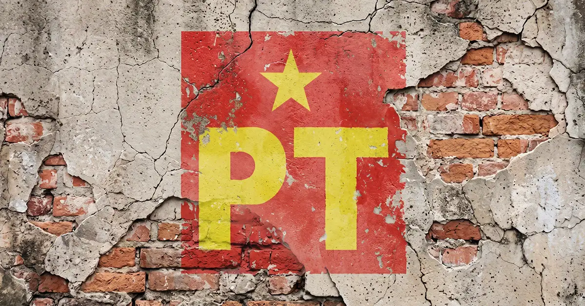 Logo del Partido del Trabajo sobre una pared desgastada