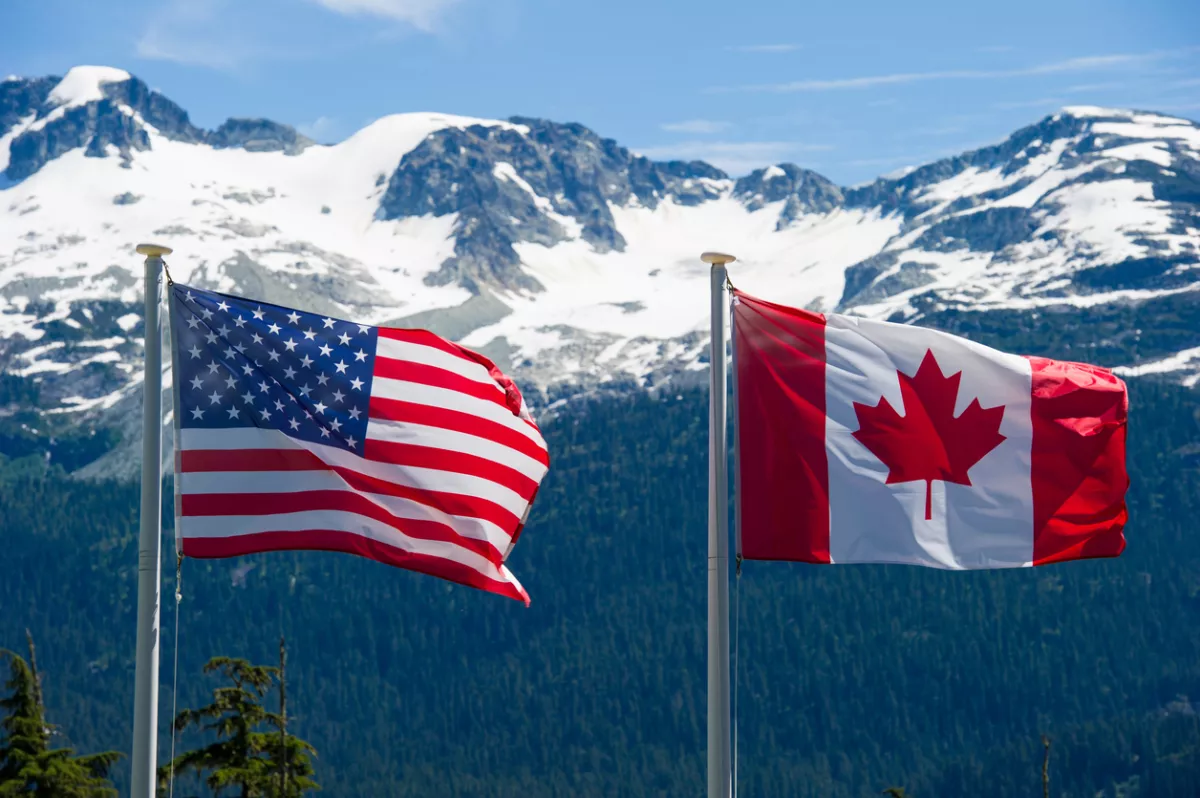 Canadian and American flags