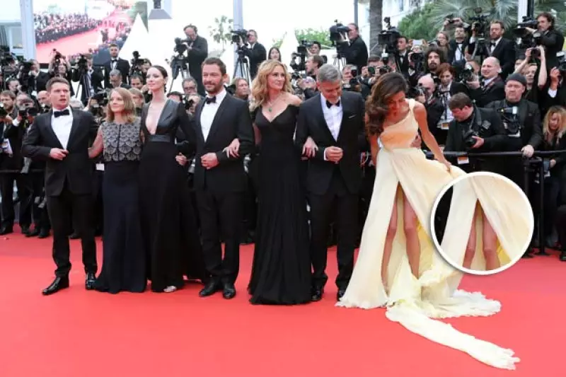 Durante su paso por el festival de cine francés, la esposa de George Clooney estuvo a punto de sufrir un 'wardrobe malfunction' con su vestido amarillo palo Atelier Versace.