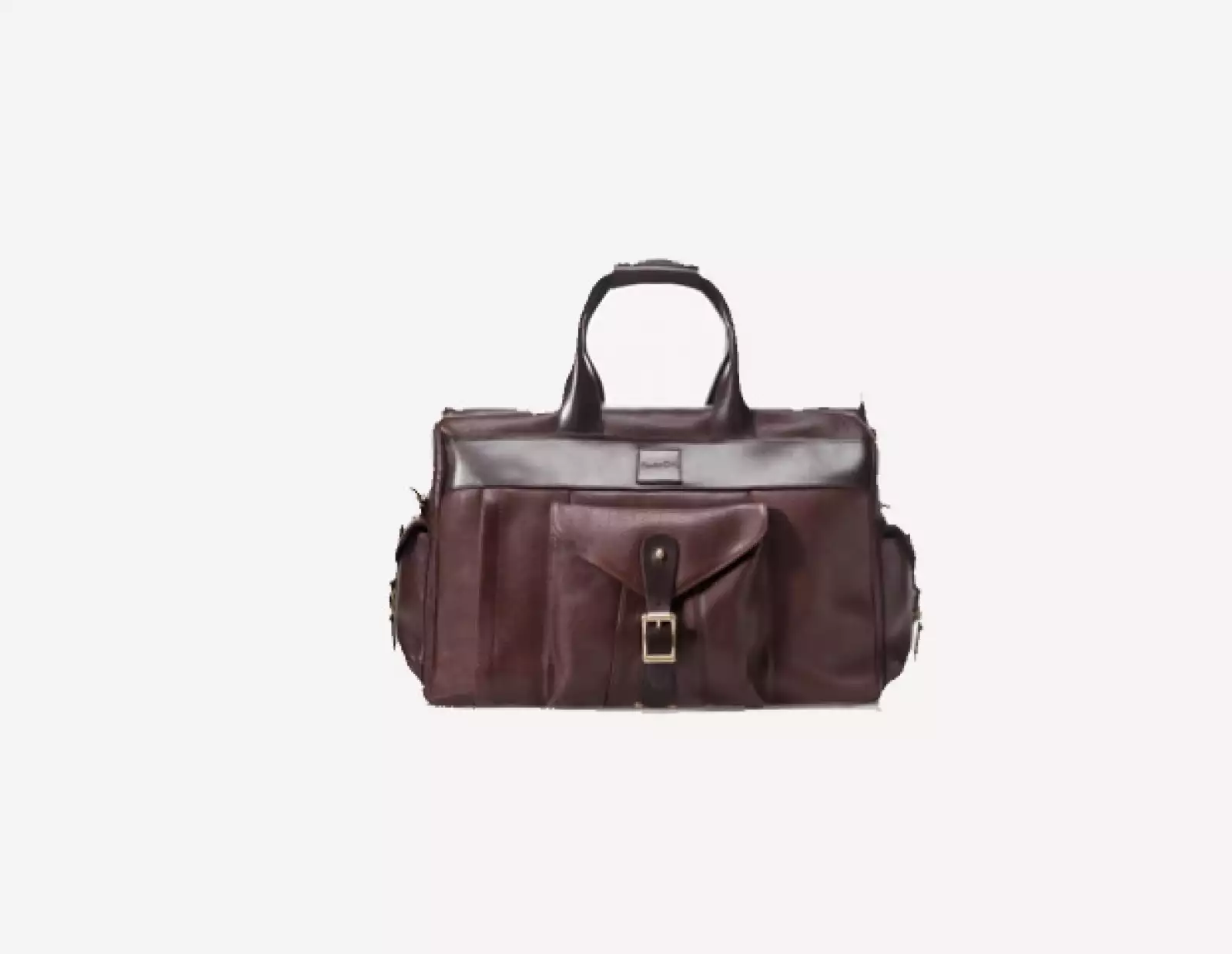 Massimo Dutti propone una sofisticada manera de viajar con una maleta confeccionada en piel de becerro.