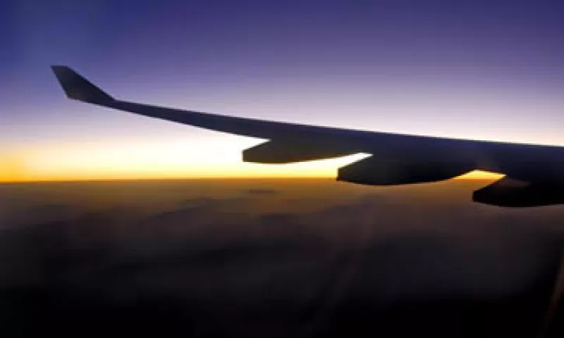 Delta Air Lines y US Airways Group no vislumbran señal alguna de que la demanda de viajes disminuya. (Foto: Photos to Go)