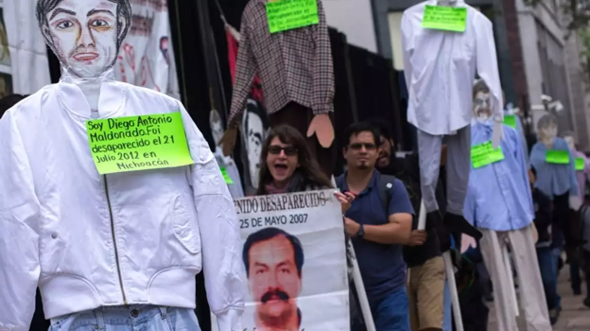 Así funcionará el Centro de identificación humana en México. (Familiares de personas desaparecidas protestando).  