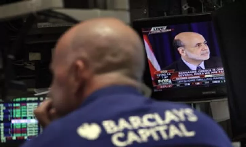 Analistas prevén que la Fed extienda el vencimiento de sus tenencias de bonos al comprar deuda del Tesoro de mayor plazo. (Foto: AP)