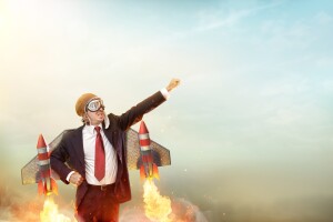 Aviator Businessman With Jetpack On His Back - Startup Concept