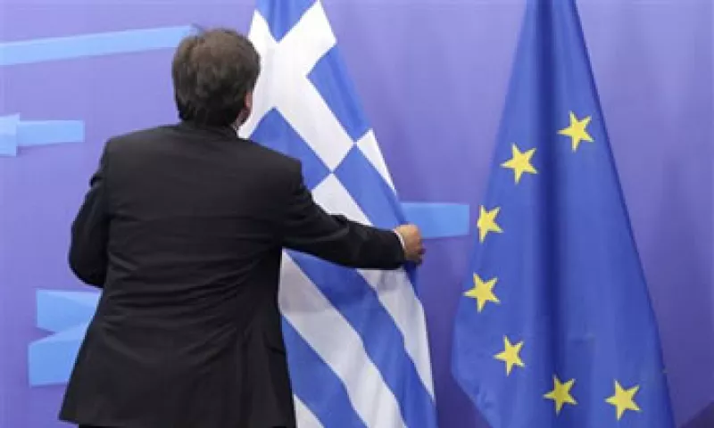 Los acreedores privados de Grecia asumirán una pérdida del 21% de sus bonos. (Foto: AP)