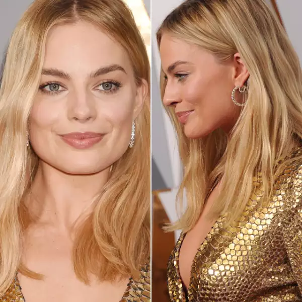 Claro que Margot Robbie iba a lucir de impacto. Su maquillaje natural pero dorado, la hicieron lucir guapísima. El pelo lo llevó suelto y natural. El toque perfecto a el impecable vestido dorado.
