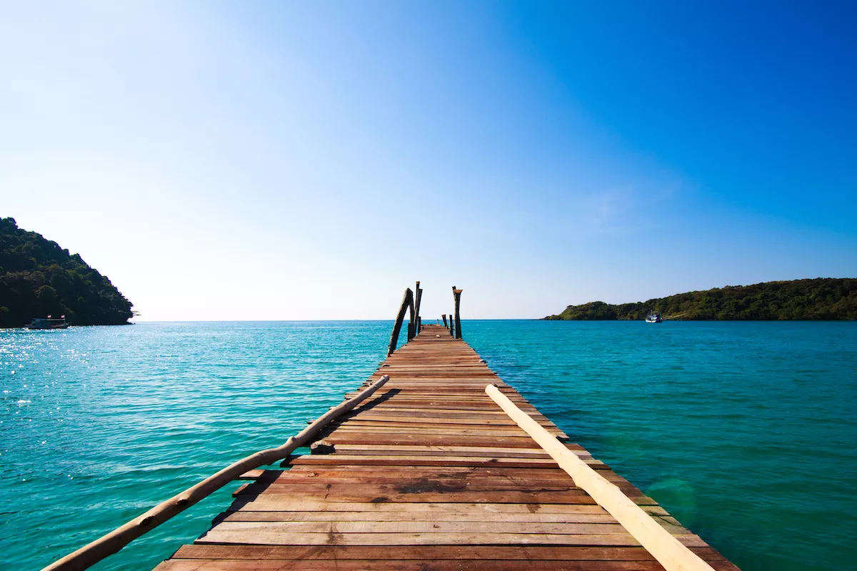 Tropical Resort.  boardwalk on beach