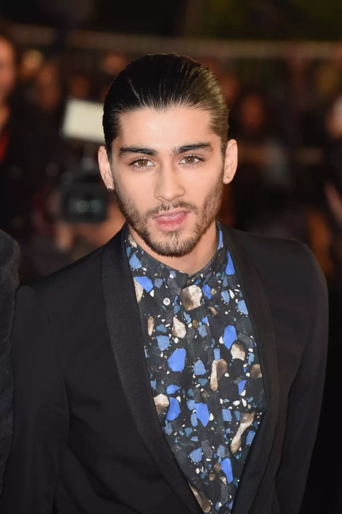 El ahora exmiembro de One Direction, Zayn Malik, dio sus primeras declaraciones desde que anunció su salida del grupo esta semana y aseguró que lamenta el dolor que ha causado entre sus seguidoras.