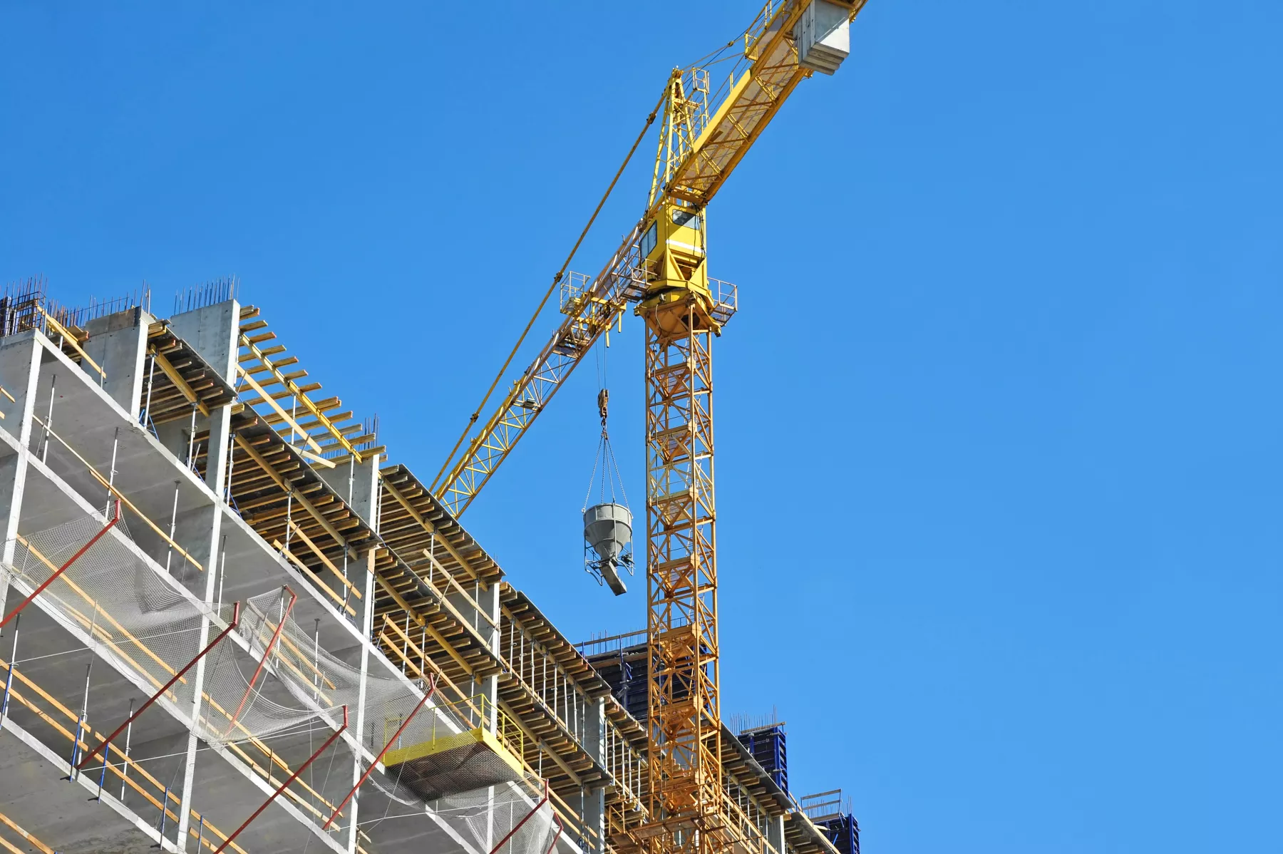Crane and highrise construction site