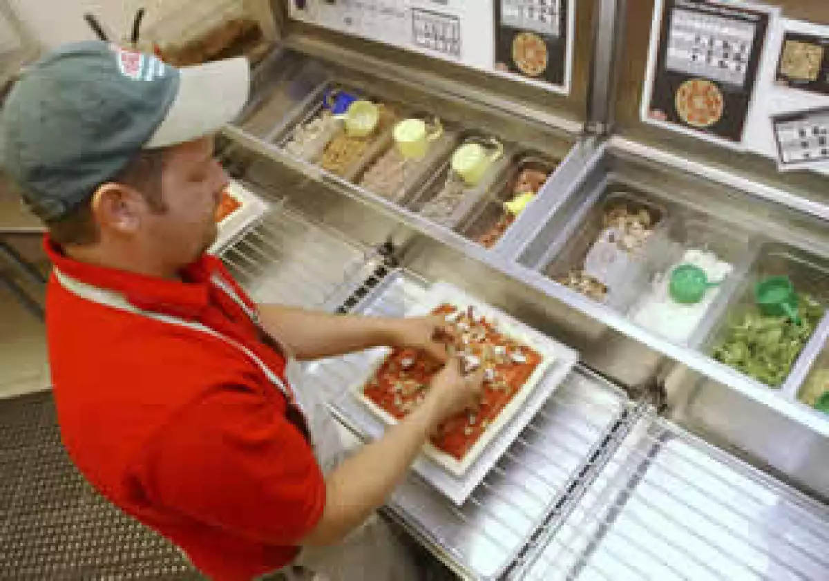 La cadena de pizzerías Papa John’s se esfuerza por ofrecer productos de calidad. (Foto: AP)