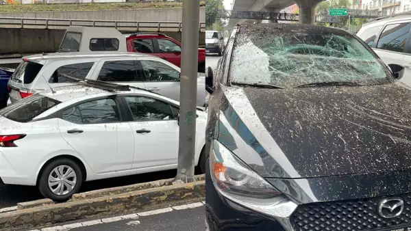 ¿Qué pasó en Periférico Sur? Cae canaleta del segundo piso sobre dos autos 