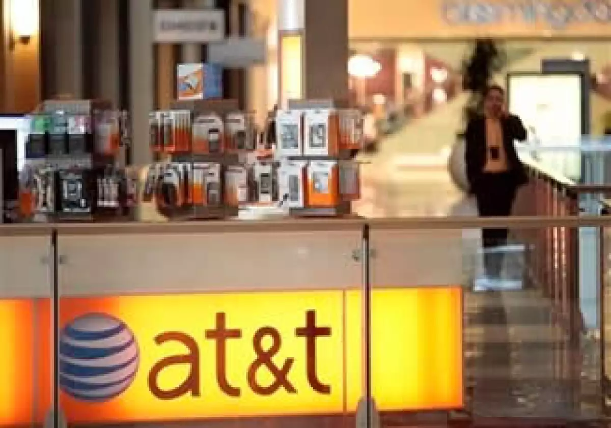 La empresa añadió 2.7 millones de suscriptores, en parte gracias a su acuerdo con Apple por el iPhone. (Foto: AP)