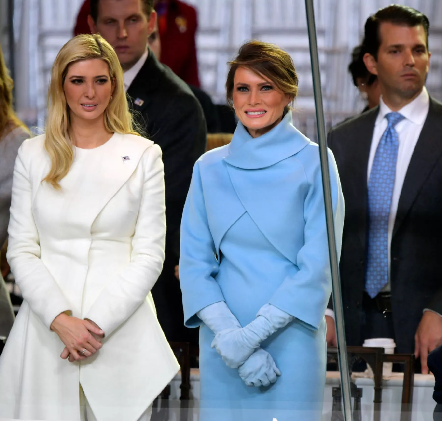 Newly sworn in President Donald Trump with his wife Melania walk down Pennsylvania Avenue in front of the White House
