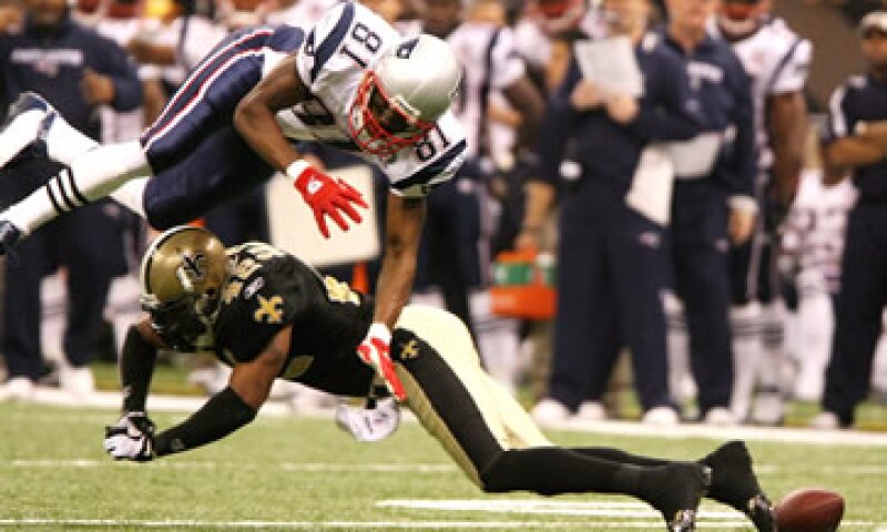 La NFL ofreció un paquete de servicio de transmisión de juegos en vivo a través de plataformas digitales. (Foto: EFE )