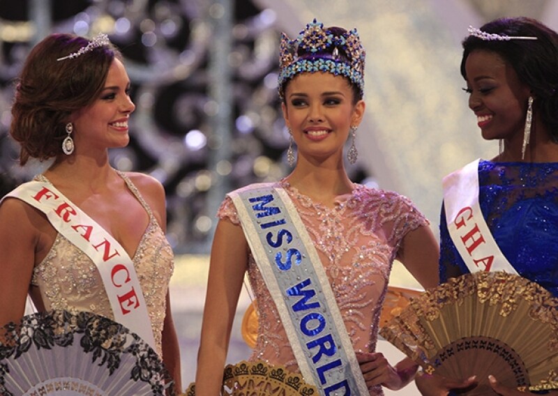 Megan Young, fue coronada ayer en medio de intensas medidas de seguridad en la isla de Bali, a donde se trasladó el evento a raíz de continuas protestas de grupos islamistas.