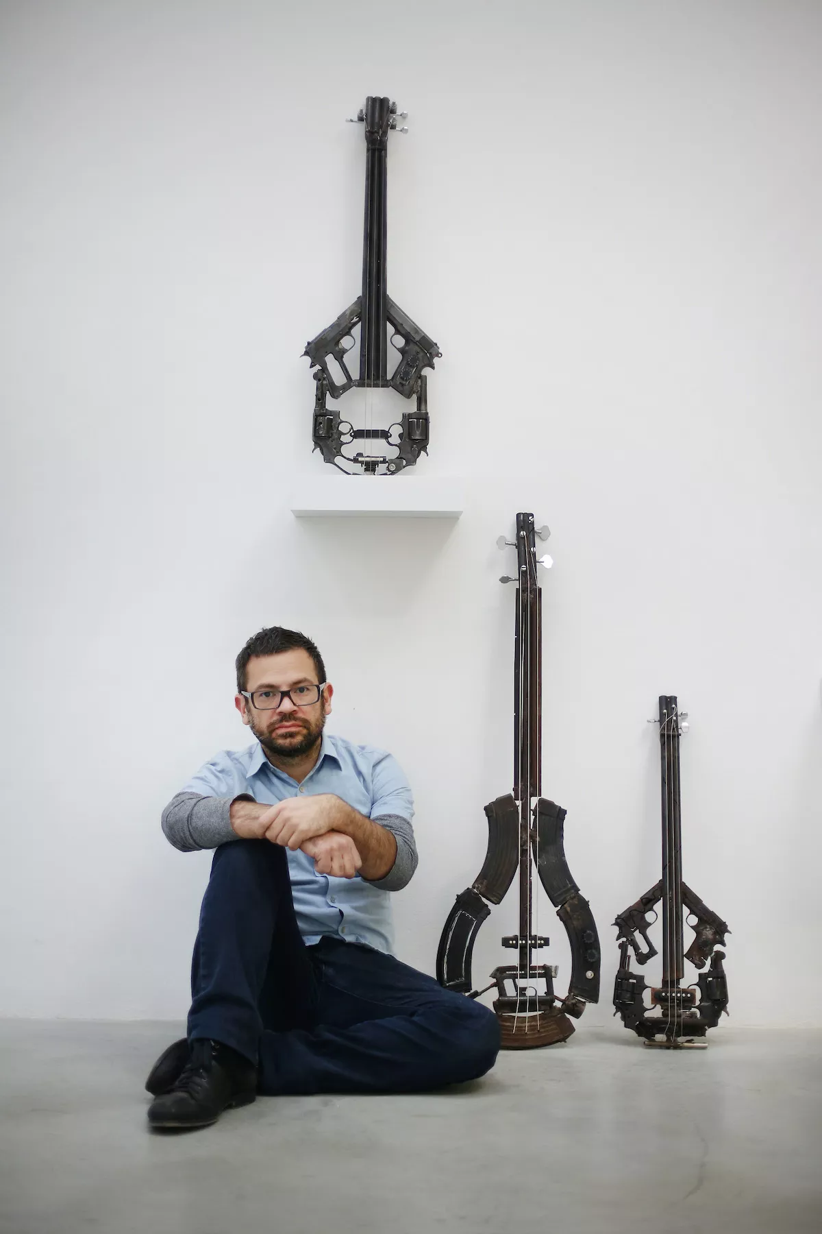 Mexican Artist Pedro Reyes Rehearses Using Musical Instruments He Has Created From Weapons Confiscated From Mexican Cartels