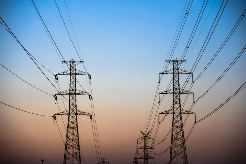 Couple Electricity pylon at sunset