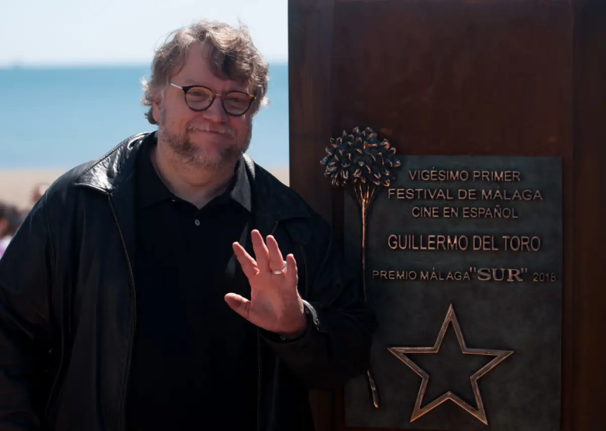 Mexican film director Guillermo del Toro poses next to a
