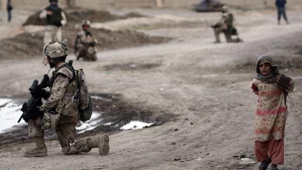 Canadian soldiers of NATO-led coalition take positions during patrol in stronghold of Panjwaii in Kandahar province