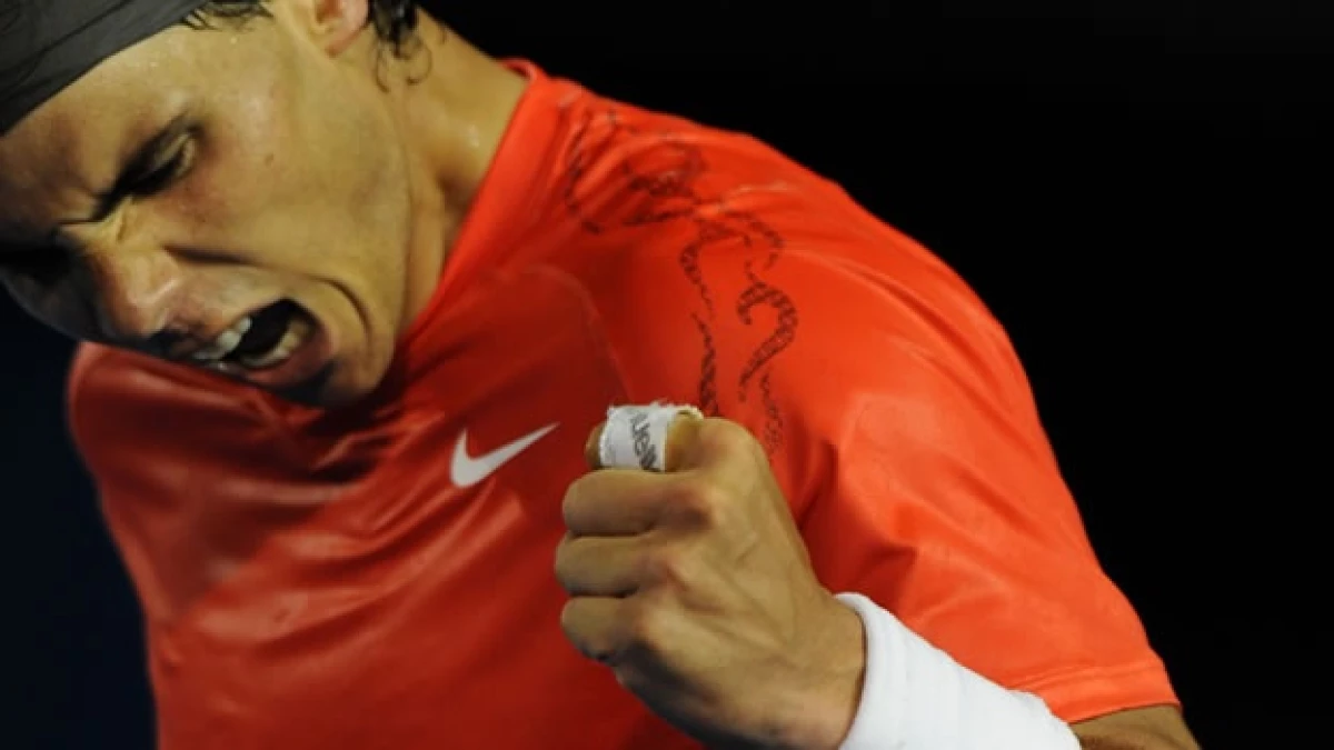 Nadal festeja tras derrotar al australiano Tomic