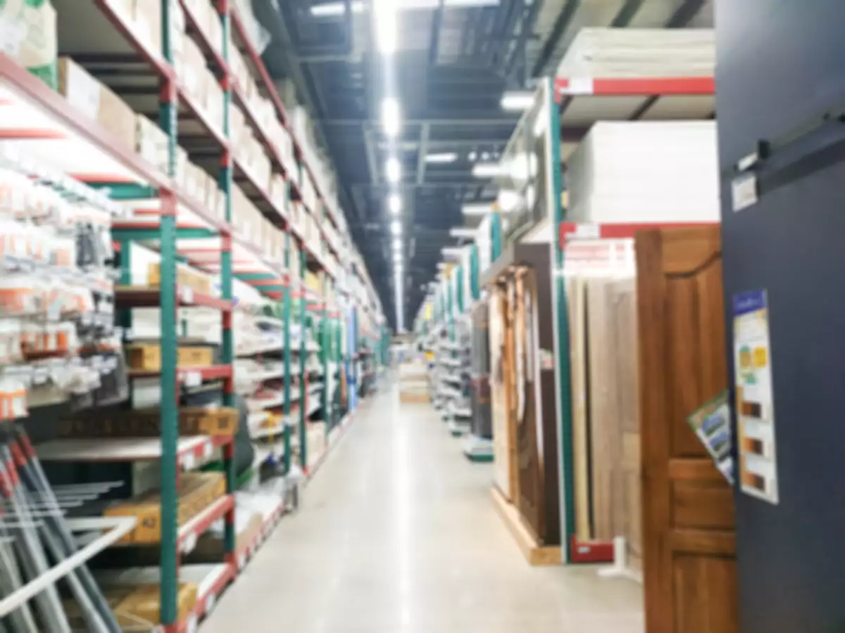 Blur supermarket and houseware store area in shopping mall interior for background