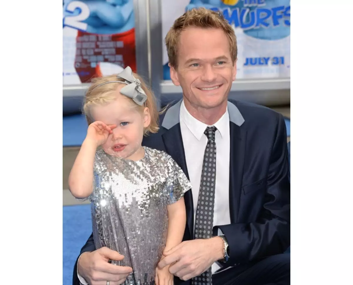 El actor con una de sus hijas.