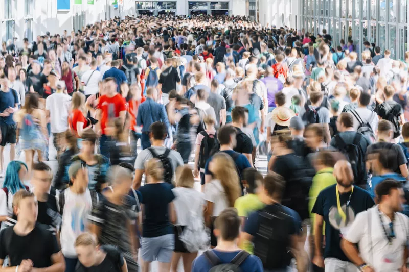crowd of people at a trade fair