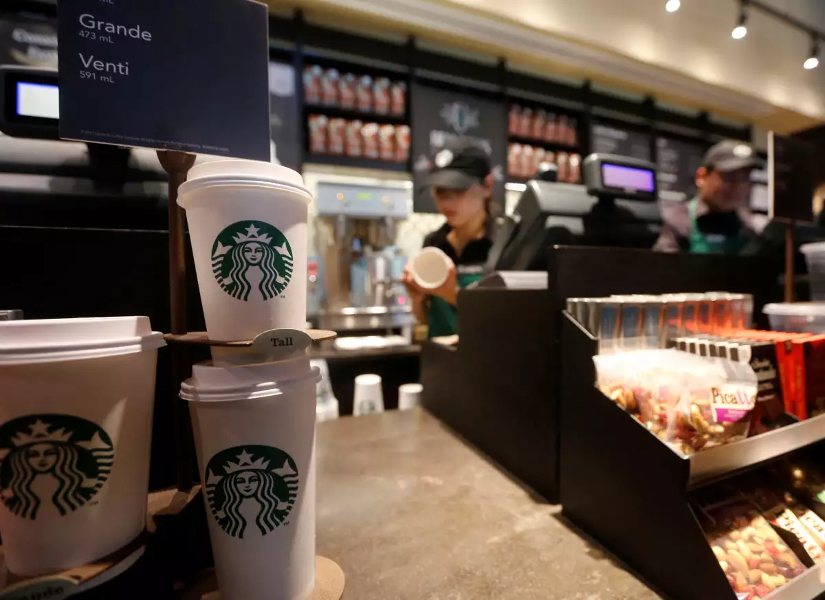FILE PHOTO: Paper cups of different sizes are seen on display at Starbuck's first Colombian store at 93 park in Bogota