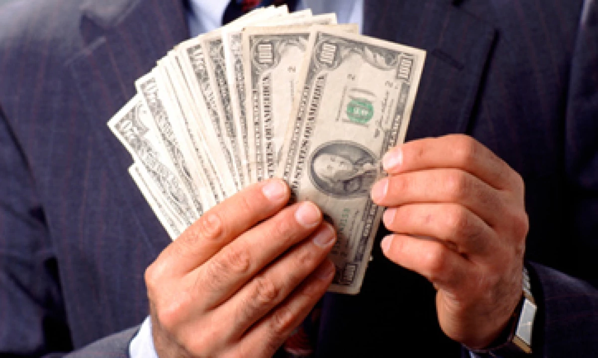 El tipo de cambio podría fluctuar este miércoles entre 12.36 y 12.49 pesos por dólar, estima Banco Base. (Foto: Getty Images)