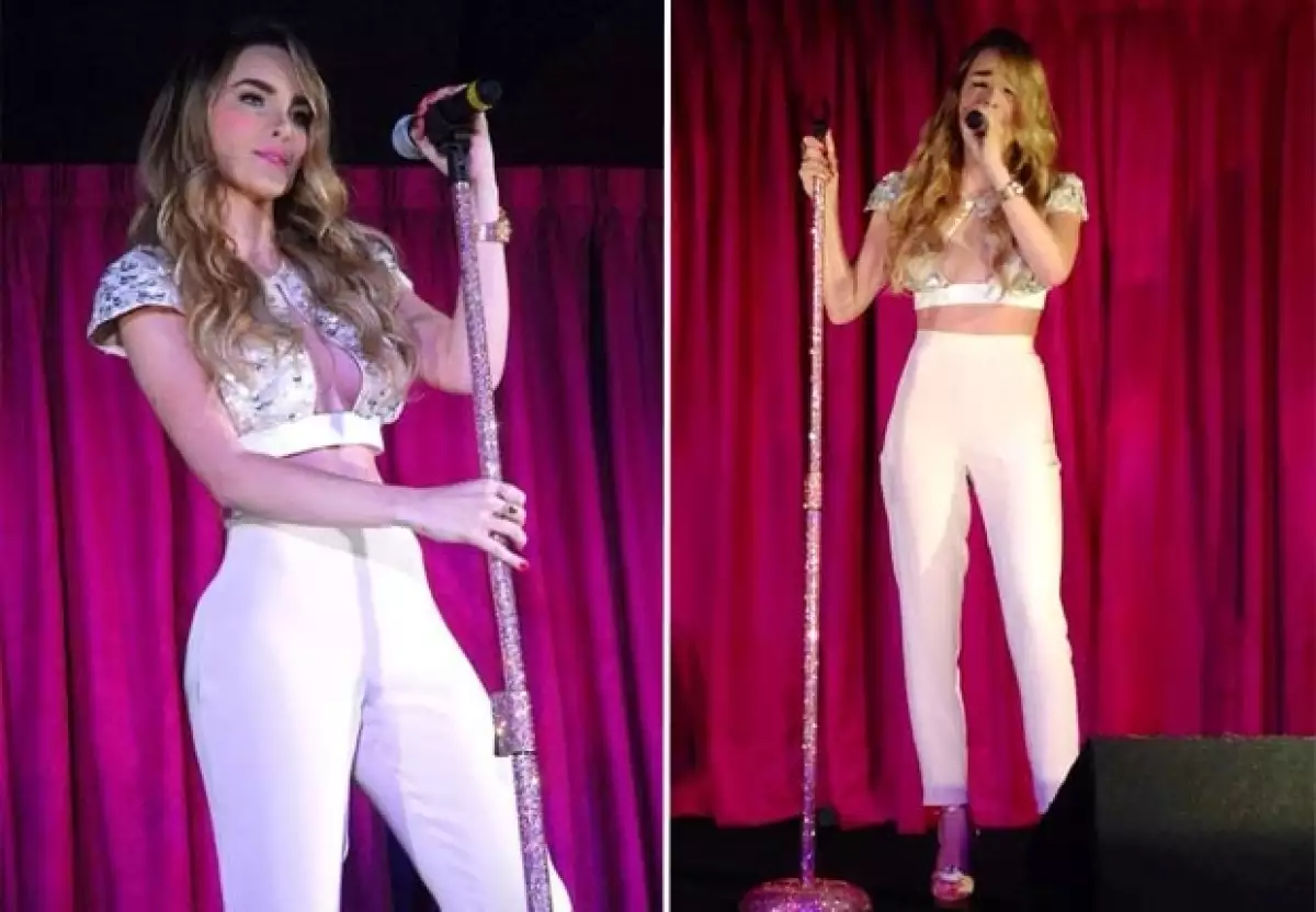 La cantante y su hermano se estrenaron la noche de ayer en el mundo de los negocios, ella lució guapísima con dos cambios de vestuario.