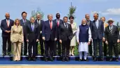 El presidente del Consejo Europeo, Antonio Costa, la primera ministra de Italia, Giorgia Meloni, el presidente de Corea del Sur, Lee Jae-myung, el presidente de Egipto, Abdel Fattah El-Sisi, el primer ministro británico, Keir Starmer, el presidente de los Estados Unidos, Donald Trump, el presidente de Kenia, William Ruto, el presidente de Francia, Emmanuel Macron, el primer ministro de Japón, Sanae Takaichi, el primer ministro de la India, Narendra Modi, el primer ministro de Canadá Mark Carney, el canciller de Alemania, Friedrich Merz, el presidente de la Comisión Europea,