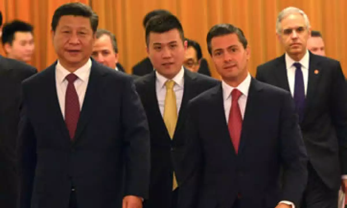 Durante la visita de Estado de Peña Nieto a China, Pemex firmó acuerdos de cooperación con la petrolera china CNOOC y el banco China Development Bank. (Foto: Notimex )