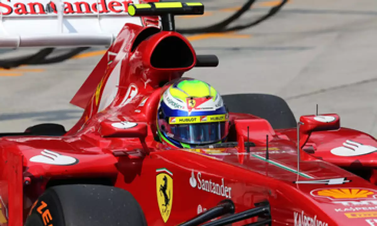 El logotipo de UPS aparecerá en los autos de carreras F138 de Ferrari que conducen Fernando Alonso y su compañero de equipo Felipe Massa. (Foto: AP)