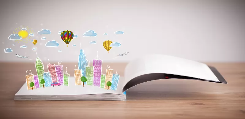 cityscape drawing on open book