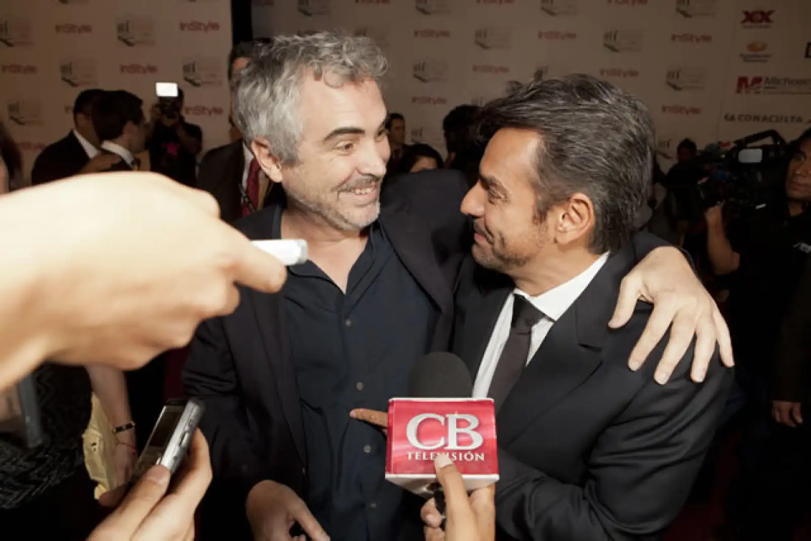 Alfonso Cuarón y Eugenio Derbez.