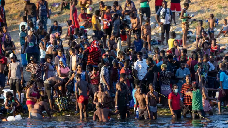 Large Migration Surge Crosses Rio Grande Into Del Rio, Texas