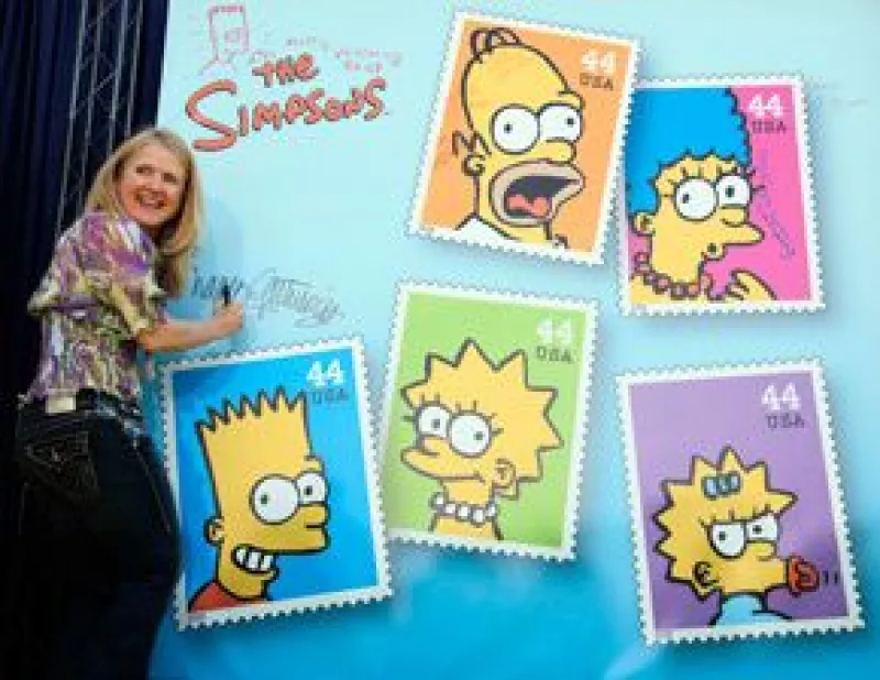 Miembros del equipo de la popular serie animada asistieron el jueves a la presentación de cinco estampillas de sus personajes.