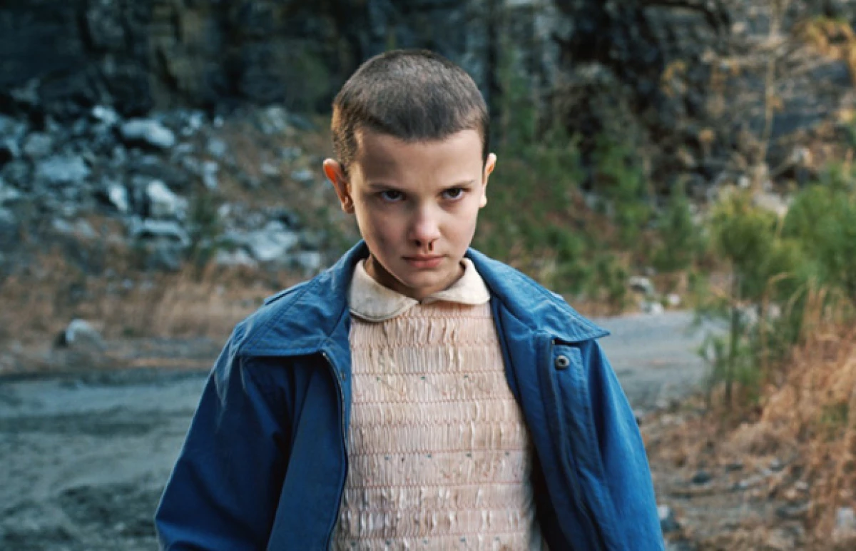 Con solo 12 años, Millie Brown, mejor conocida por su personaje en Strager Things, se enfrentó a uno de los retos más duros de su vida: deshacerse por completo de su pelo. Descubre cómo lo vivió.