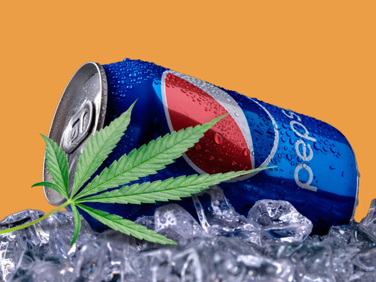 Can and glass of Pepsi cola
