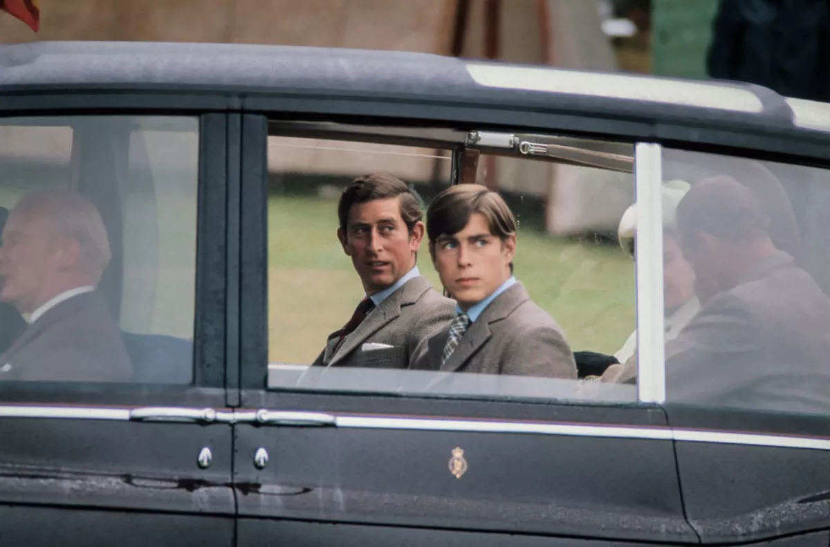 Princes Charles & Andrew Ride In A Rolls Royce