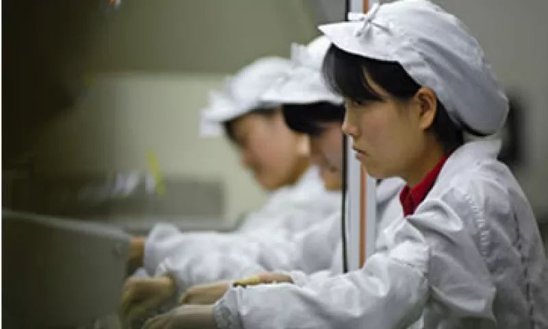 Si la economía china sigue en desaceleración, 2016 será un año mediocre para la economía mundial, dicen la OCDE y el FMI. (Foto: (EFE) )