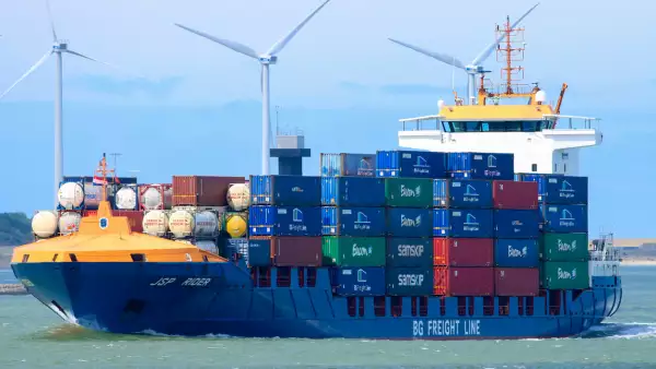 Container freight arriving at Rotterdam harbour in the Netherlands