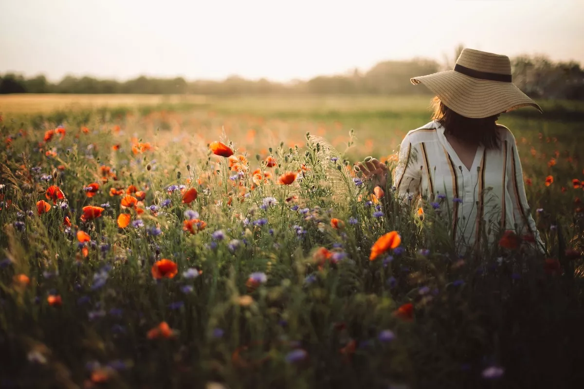 Stylish,Woman,In,Rustic,Dress,And,Hat,Walking,In,Summer