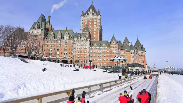 Chateau Frontenac in winter and traditional slide on the foreground, Quebec City