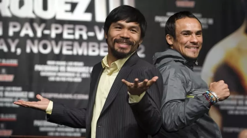 Los boxeadores Manny Pacquiao y Juan Manuel Márquez posan