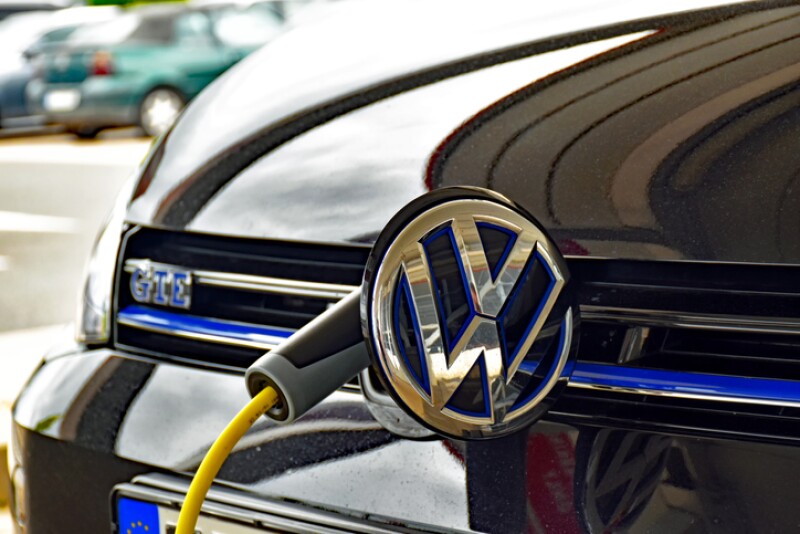 Volkswagen Golf GTE is charged at a charging station
