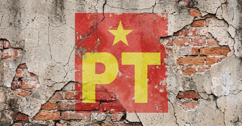 Logo del Partido del Trabajo sobre una pared desgastada