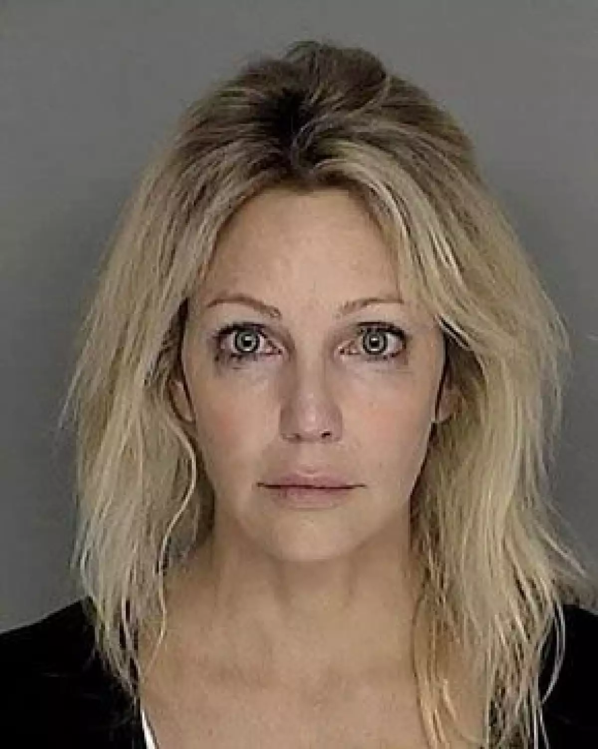 Aseguran que Jill Ishkanian se benefició de imágenes tomadas tras la detención de la ex protagonista de 'Melrose Place'.